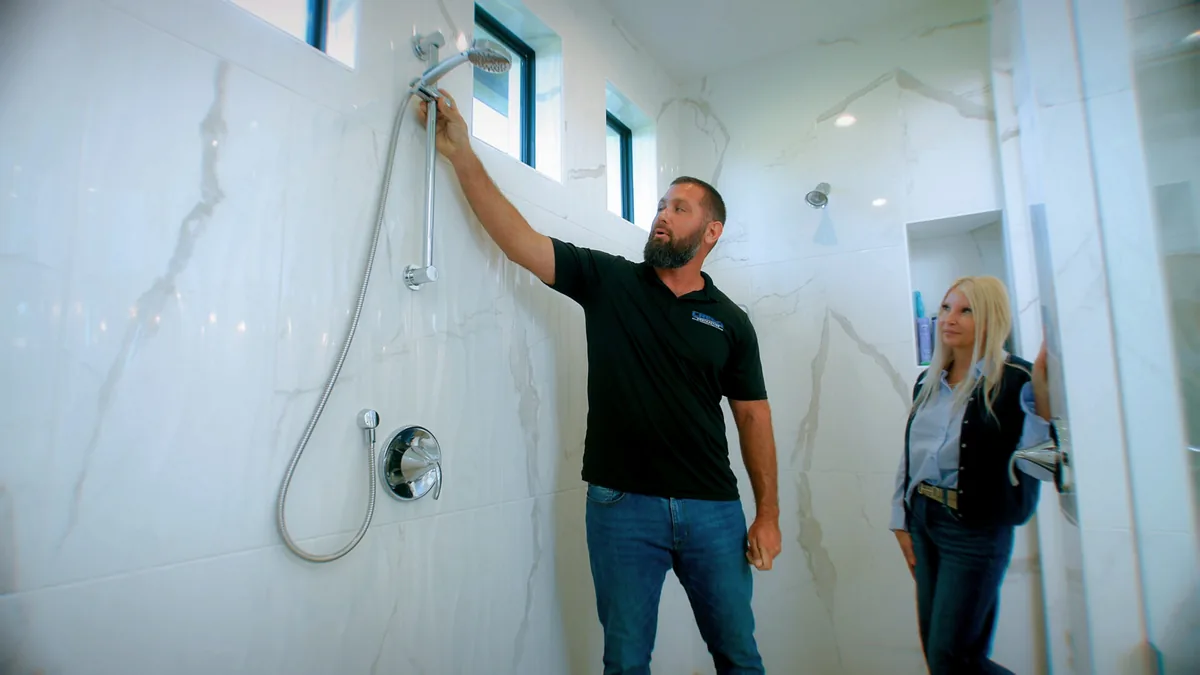 Crego Contracting walking a Wesley Chapel homeowner through their bathroom before a remodel