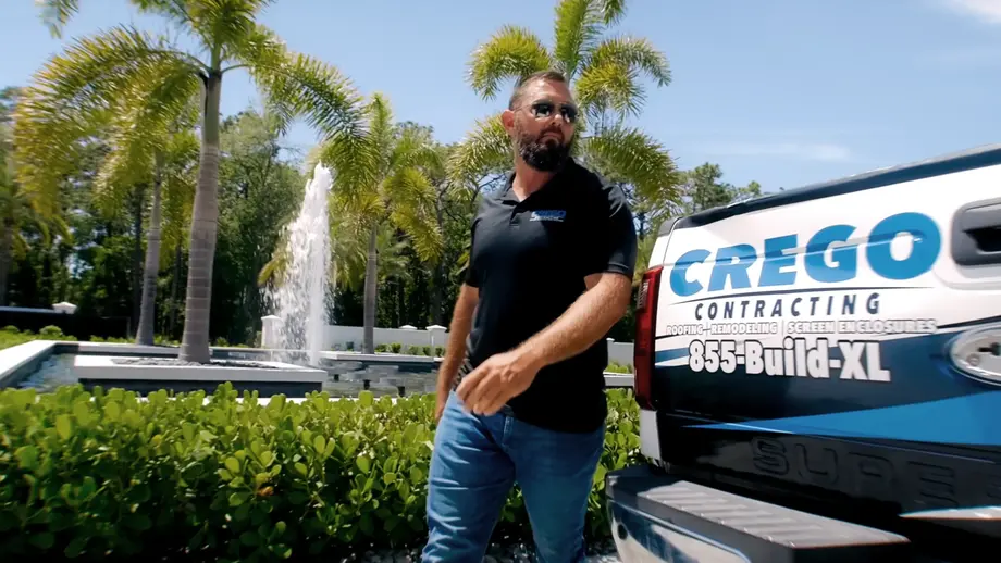 Crego arriving in the truck, phone visible